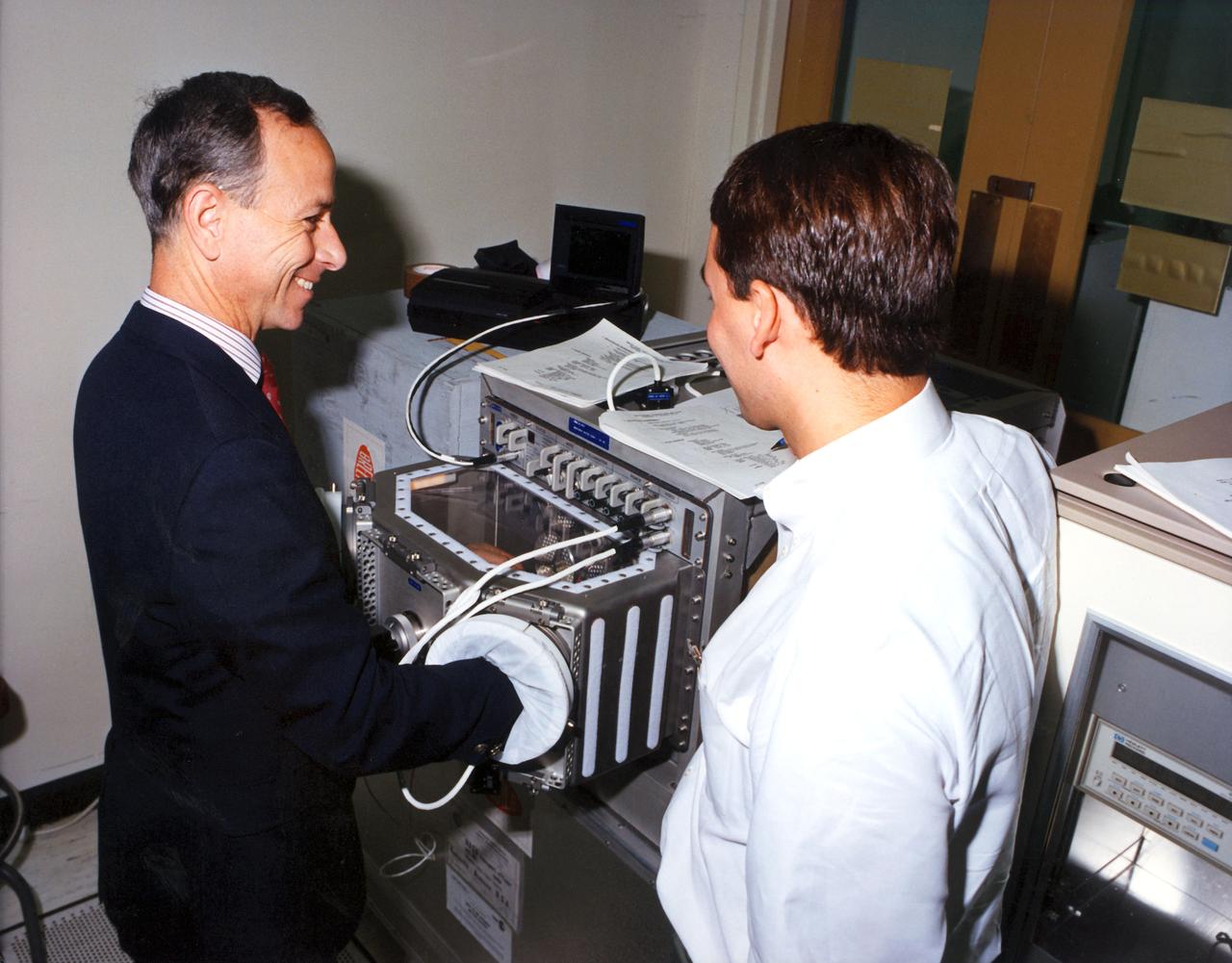 Oscillatory Thermocapillary Flow Experiment (OTFE); by using silicone oil for a study on the characteristics of themocapillary flow during the onset of oscillations with particular attention to parameters; the experiment will use submerged heaters to provide a constant temperature source in open cylindrical containers to cause thermocapillary flows. Thermocouples located in the heaters, the container walls, and the fluid will monitor the temperatures in the apparatus. Tracer particles will be added to the silicone oil sample to allow observation of the flow.