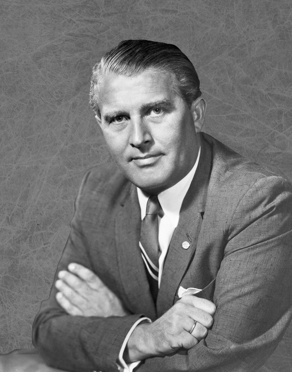 Dr. Wernher von Braun served as Marshall Space Flight Center's first director from July 1, 1960 until January 27, 1970, when he was appointed NASA Deputy Associate Administrator for Plarning. Following World War II, Dr. von Braun and his German colleagues arrived in the United States under Project Paperclip to continue their rocket development work. In 1950, von Braun and his rocket team were transferred from Ft. Bliss, Texas to Huntsville, Alabama to work for the Army's rocket program at Redstone Arsenal and later, NASA's Marshall Space Flight Center. Under von Braun's leadership, Marshall developed the Saturn V launch vehicle which took Apollo astronauts to the moon.