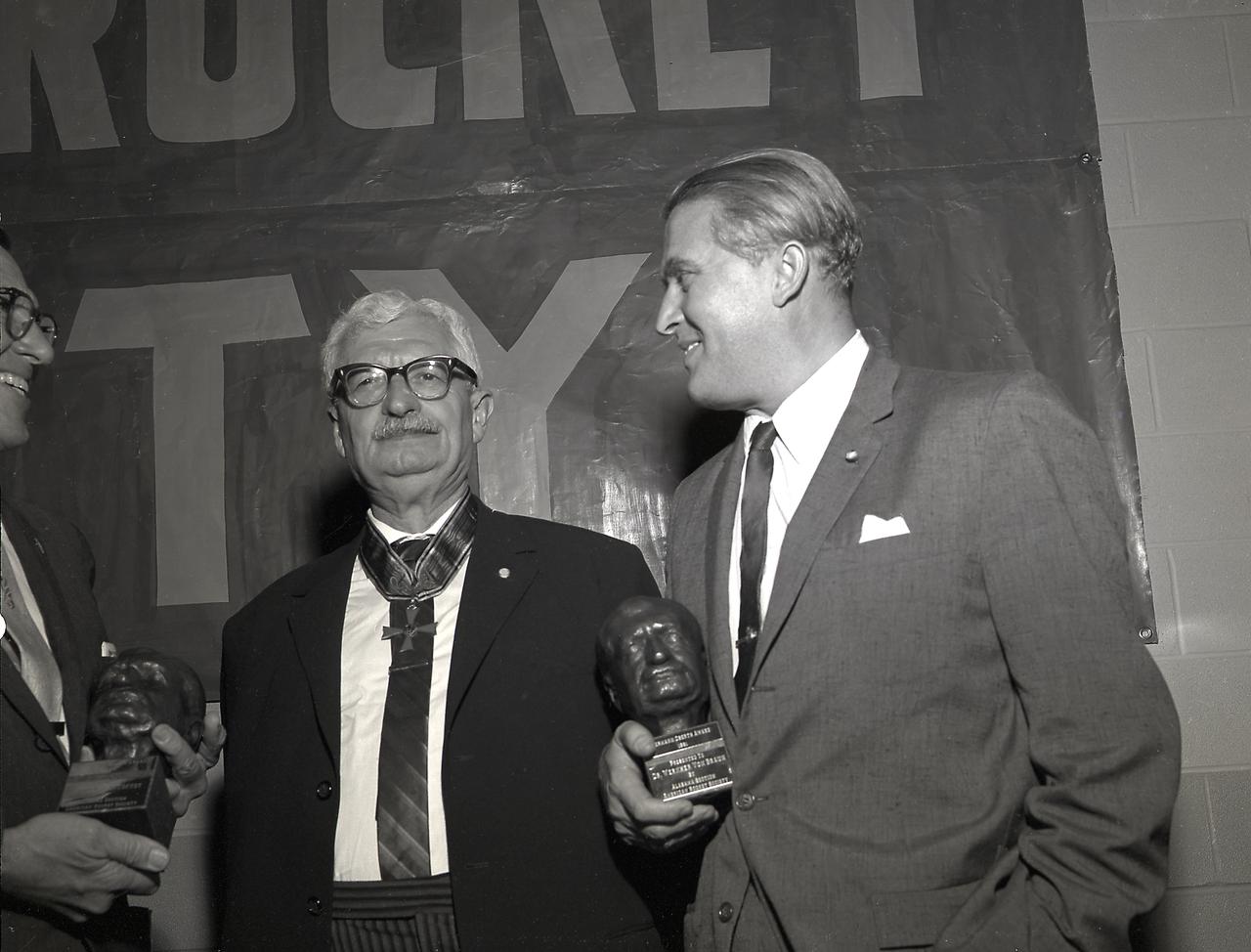 Dr. Wernher von Braun holds the coveted Hermarn Oberth award presented to him by Professor Oberth during the banquet hosted by the Alabama Section of the American Rocket Society (ARS), on October 19, 1961. The Oberth award was given for outstanding technical contributions to the field of astronautics or for the promotion and advancement of astronautical sciences. 