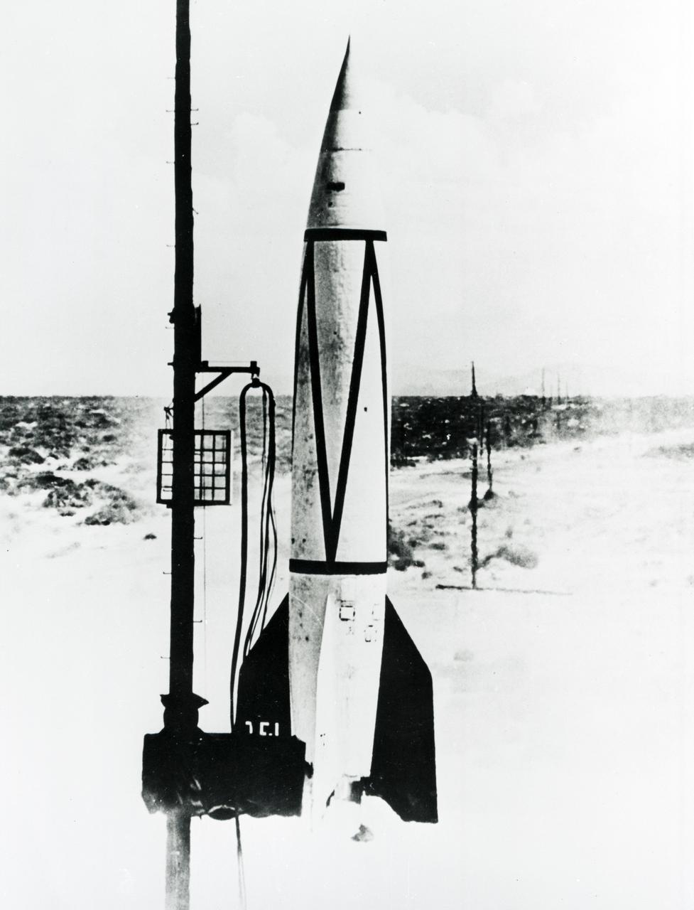 A V-2 rocket takes flight at White Sands, New Mexico, in 1946. The German engineers and scientists who developed the V-2 came to the United States at the end of World War II and continued rocket testing under the direction of the U. S. Army, launching more than sixty V-2s.
