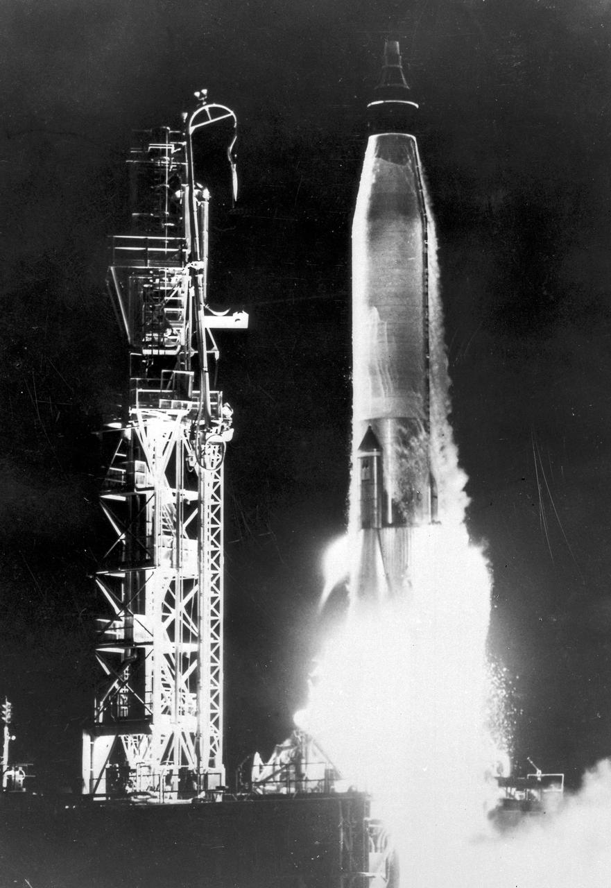 An Atlas launch vehicle carrying the Big Joe capsule leaves its launching pad on a 2,000-mile ballistic flight to the altitude of 100 miles. The Big Joe capsule is a boilerplate model of the marned orbital capsule under NASA's Project Mercury. The capsule was recovered and studied for the effect of re-entry heat and other flight stresses. 