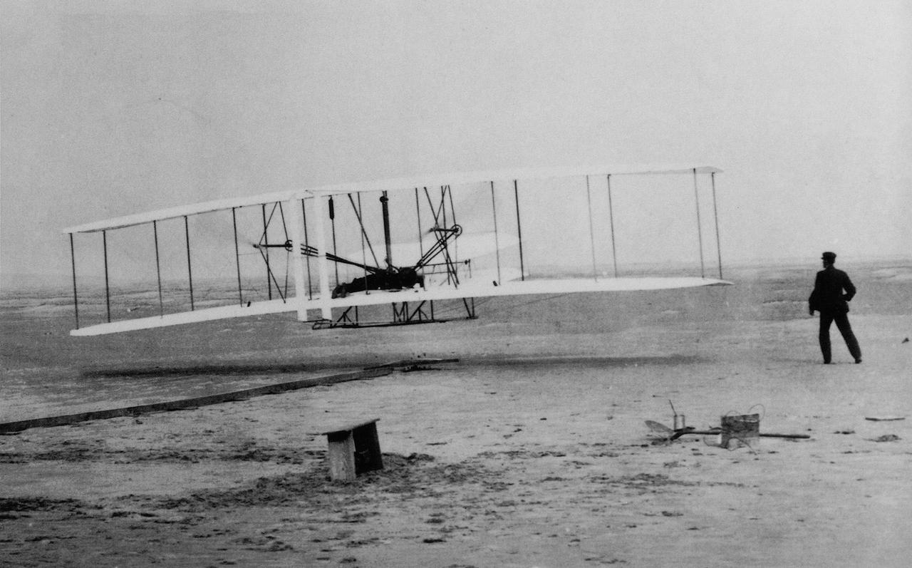 On December 17, 1903, two brothers from Dayton, Ohio, named Wilbur and Orville Wright, were successful in flying an airplane they built. Their powered aircraft flew for 12 seconds above the sand dunes of Kitty Hawk, North Carolina, making them the first men to pilot a heavier-than-air machine that took off on its own power, remained under control, and sustained flight.