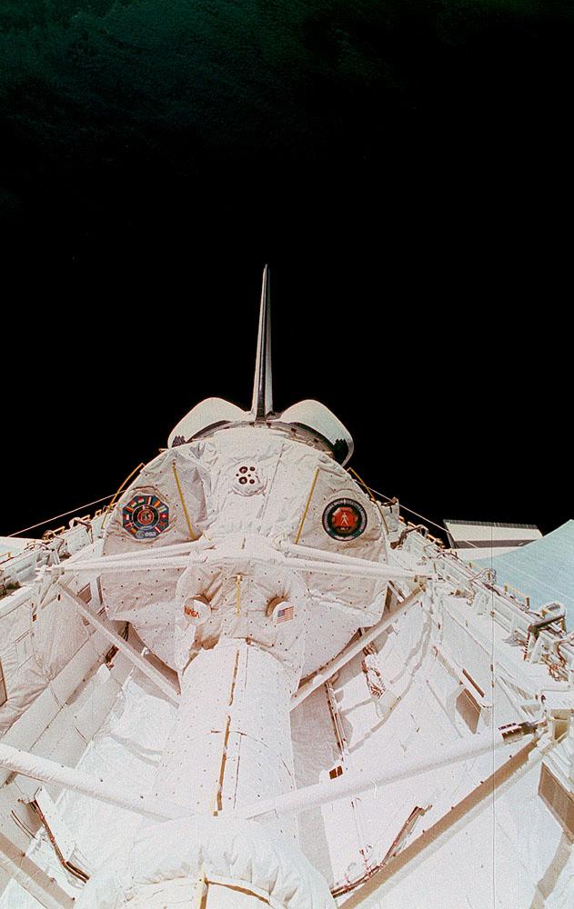 This is the Space Shuttle Orbiter Discovery, STS-42 mission, with the First International Microgravity Laboratory (IML-1) module shown in the cargo bay. IML-1, the first in a series of Shuttle flights, was dedicated to study the fundamental materials and life sciences in the microgravity environment inside Spacelab, a laboratory carried aloft by the Shuttle. The mission explored how life forms adapt to weightlessness and investigated how materials behave when processed in space. The IML program gave a team of scientists from around the world access to a unique environment, one that is free from most of Earth's gravity. The 14-nation European Space Agency (ESA), the Canadian Space Agency (SCA), the French National Center for Space Studies (CNES), the German Space Agency and the German Aerospace Research Establishment (DARA/DLR), and the National Space Development Agency of Japan (NASDA) participated in developing hardware and experiments for the IML missions. The missions were managed by NASA's Marshall Space Flight Center. The Orbiter Discovery was launched on January 22, 1992 for the IML-1 mission.