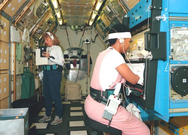 Female astronauts Jan Davis and Mae Jemison undergo training at Marshall's Spacelab-J Crew Training facility.