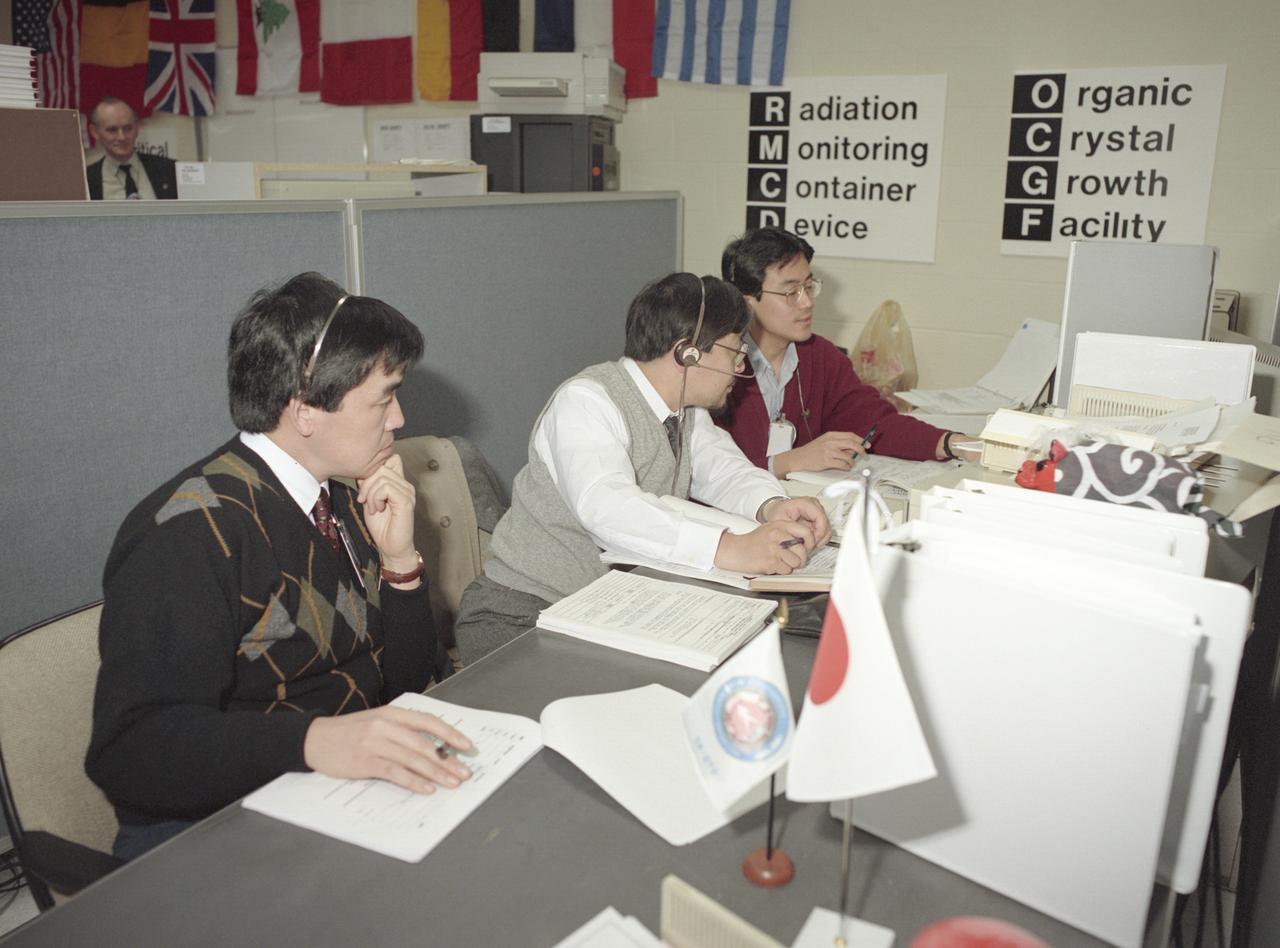 The primary payload for Space Shuttle Mission STS-42, launched January 22, 1992, was the International Microgravity Laboratory-1 (IML-1), a pressurized manned Spacelab module. The goal of IML-1 was to explore in depth the complex effects of weightlessness of living organisms and materials processing. Around-the-clock research was performed on the human nervous system's adaptation to low gravity and effects of microgravity on other life forms such as shrimp eggs, lentil seedlings, fruit fly eggs, and bacteria. Materials processing experiments were also conducted, including crystal growth from a variety of substances such as enzymes, mercury iodide, and a virus. The Huntsville Operations Support Center (HOSC) Spacelab Payload Operations Control Center (SL POCC) at the Marshall Space Flight Center (MSFC) was the air/ground communication channel used between the astronauts and ground control teams during the Spacelab missions. Featured are activities of the Organic Crystal Growth Facility (OCGF) and Radiation Monitoring Container Device (RMCD) groups in the SL POCC during the IML-1 mission.   