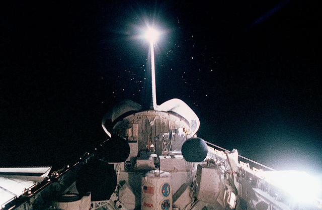 Space Shuttle Atlantis (STS-45) onboard photo of open cargo bay with the forward portion of the Atmospheric Laboratory for Applications and Science (Atlas-1) shown at night.