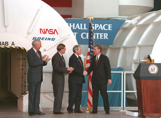 Vice-president Dan Quayle and Alabama Governor Guy Hunt are greeted by Marshall Center Director Thomas J. Lee (1989-1994) (center) and NASA Administrator Dan Goldin (shaking hands with Vice-president Quayle) at the space station engineering mock-up.