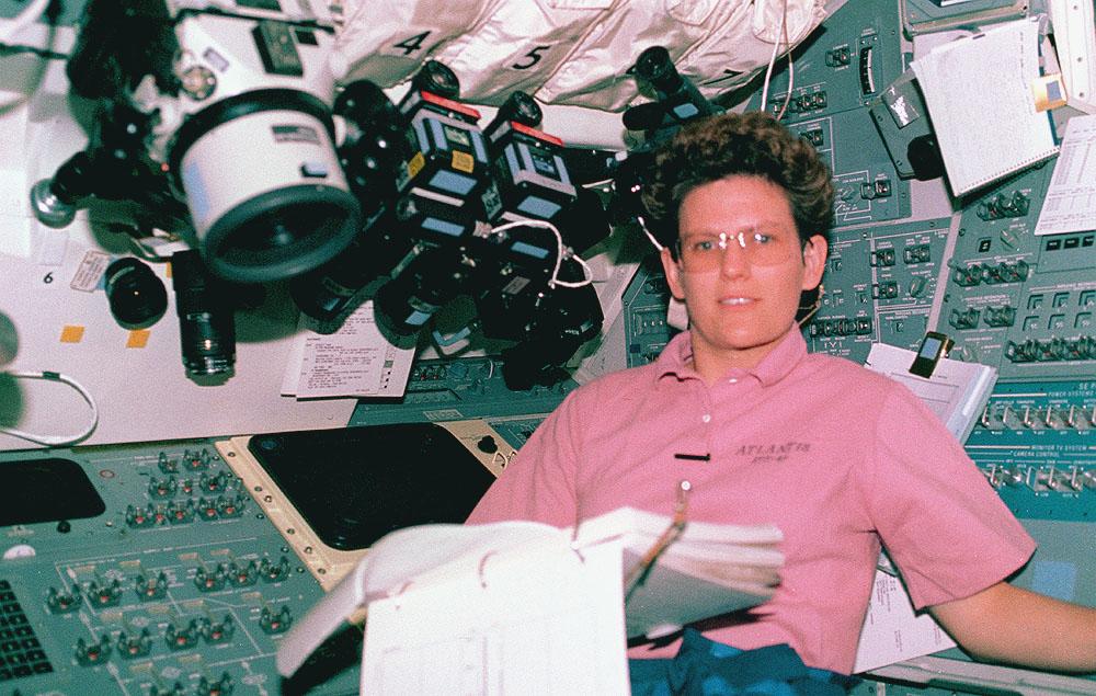 Space Shuttle Atlantis (STS-45) onboard photo of Mission Specialist Kathryn Sullivan working in the Atmospheric Laboratory for Applications and Science (Atlas-1) module. Atlas-1 flew in a series of Spacelab flights that measured long term variability in the total energy radiated by the Sun and determined the variability in the solar spectrum.