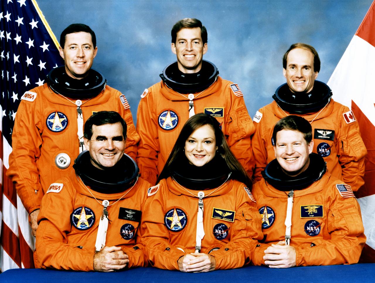 Five NASA astronauts and one Canadian payload specialist composed the STS-52 crew. Pictured on the back row, left to right, are Michael A. Baker, pilot; James B. Wetherbee, commander; and Steven G. Maclean, payload specialist. On the front row, left to right, are mission specialists Charles (Lacy) Veach, Tamara Jernigan, and William Shepherd. Launched aboard the Space Shuttle Columbia on October 22, 1992 at 1:09:39 p.m. (EDT), the crew’s primary objectives were the deployment of the Laser Geodynamic Satellite (LAGEOS II) and operation of the U.S. Microgravity Payload-1 (USMP-1). 