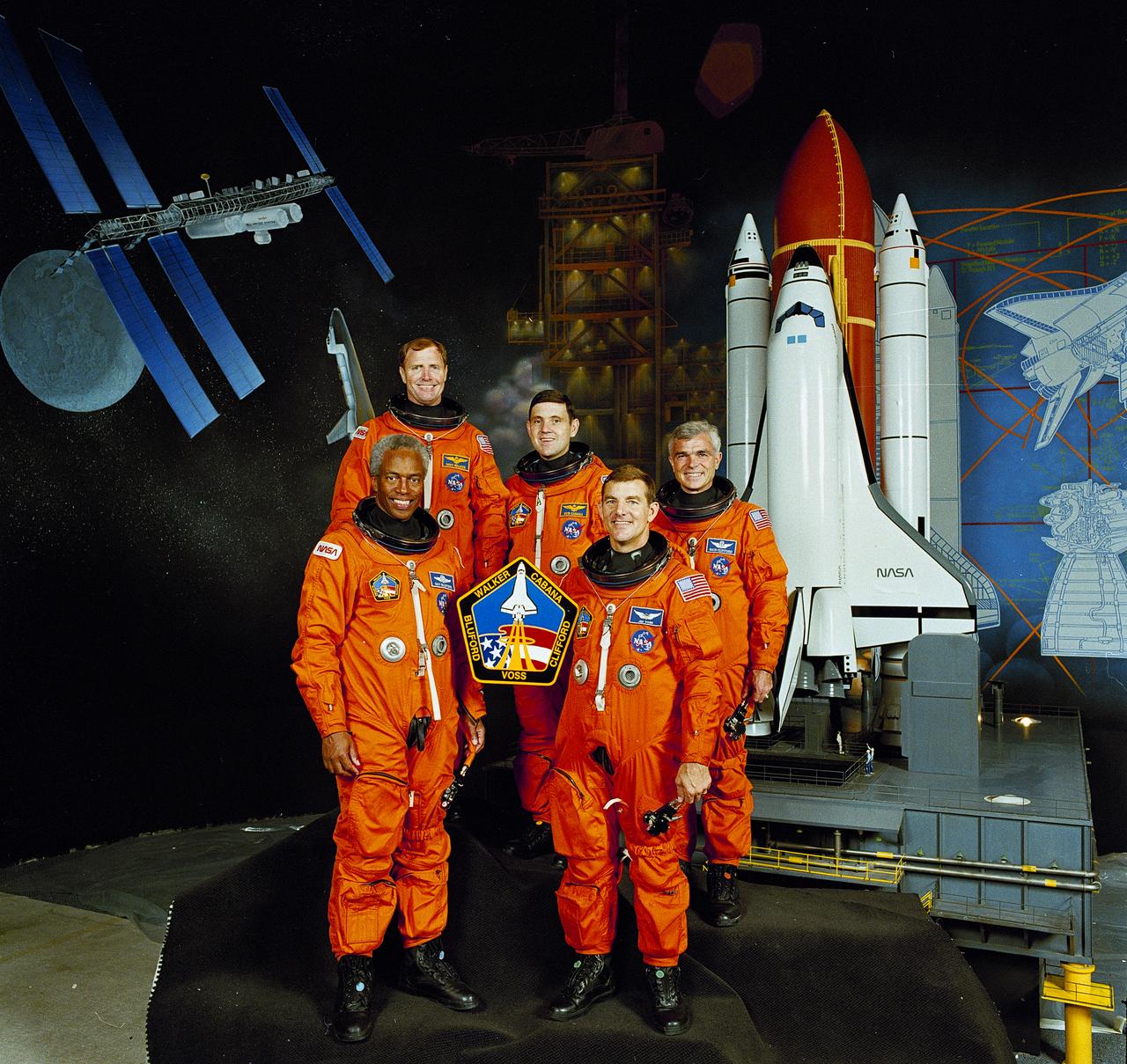 The STS-53 crew portrait included astronauts (front left to right): Guion S. Bluford, and James S. Voss, mission specialists. On the back row, left to right, are David M. Walker, commander; Robert D. Cabana, Pilot; and Michael R. (Rick) Clifford, mission specialist. The crew launched aboard the Space Shuttle Discovery on December 2, 1992 at 8:24:00 am (EST). This mission marked the final classified shuttle flight for the Department of Defense (DOD).
