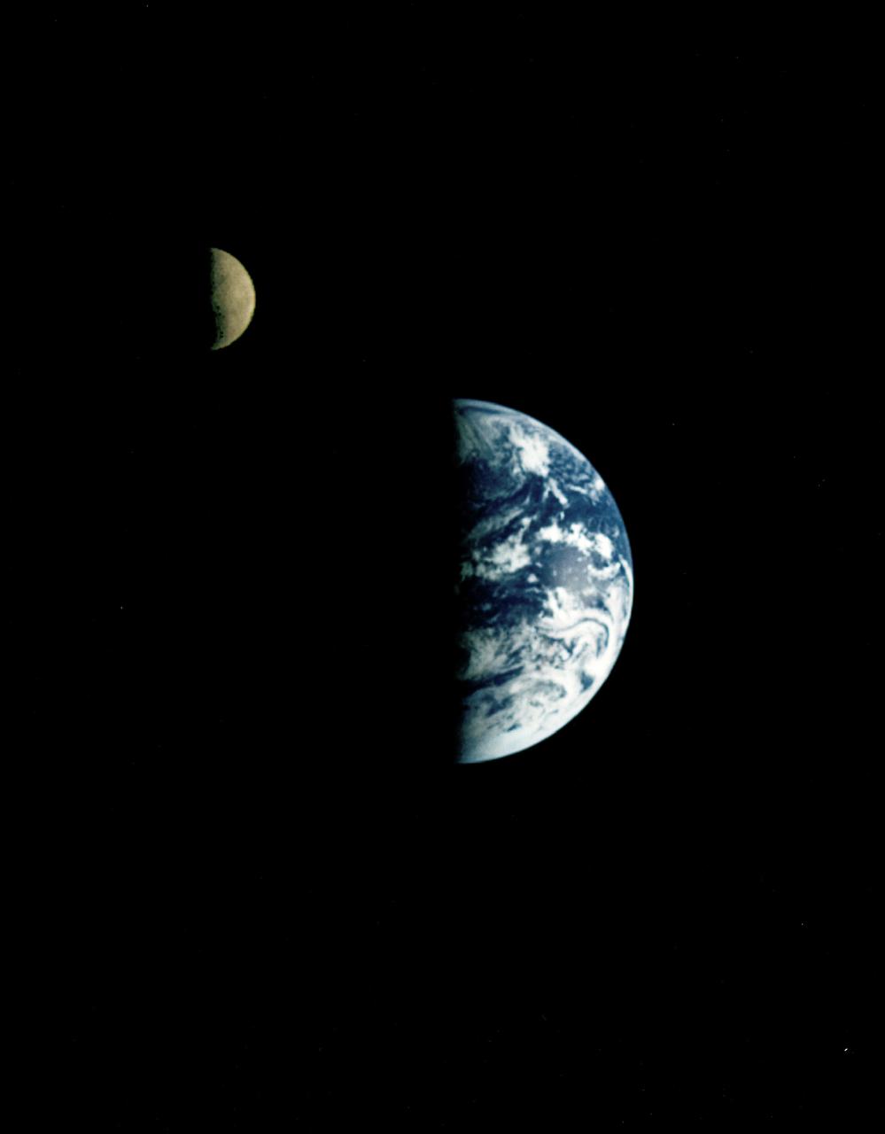 CAPE CANAVERAL, Fla. – Eight days after its encounter with the Earth, the Galileo spacecraft was able to look back and capture this remarkable view of the moon in orbit about the Earth, taken from a distance of about 6.2 million kilometers, or 3.9 million miles, on December 16.  Photo credit: NASA