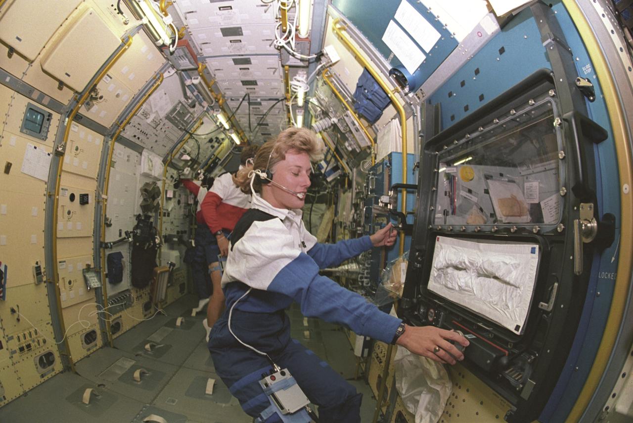 Space Shuttle Endeavour (STS-47) onboard photo of Astronaut Jan Davis inside the Spacelab-J module. Spacelab-J is a combined National Space Development Agency of Japan (NASDA) and NASA mission. The objectives included life sciences, microgravity and technology research.