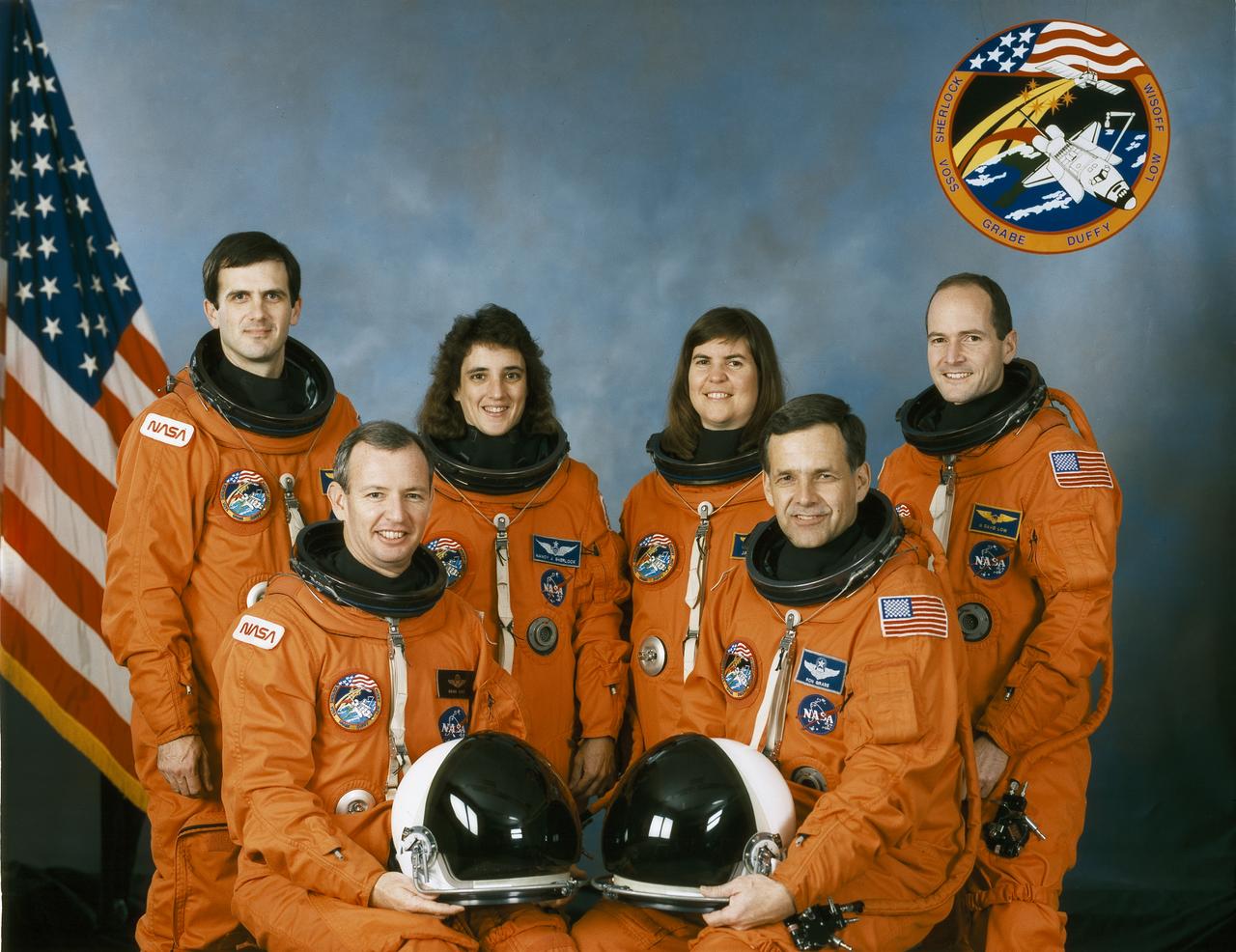 Pictured in the STS-57 crew portrait (front left to right) are Brian Duffy, pilot; and Ronald J. Grabe, commander. On the back row (left to right) are Peter J. Wisoff, Nancy J. Sherlock, and Janice E. Voss, all mission specialists; and G. David Low, payload commander. Launched aboard the Space Shuttle Endeavour on June 21, 1993 at 9:07:00 am (EDT), the STS-57 mission marked the first flight of the commercially developed SPACEHAB pressurized laboratory.