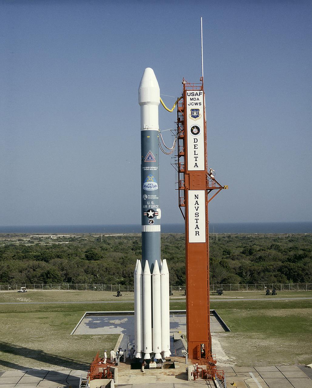 The Air Force Delta II vehicle sits poised on Complex 17A at the Cape Canaveral Air Station, ready to carry the 19th NAVSTAR Global Positioning System Satellite into orbit. A secondary NASA experiment, the Small Expendable Deployer System (SEDS), will also be deployed.