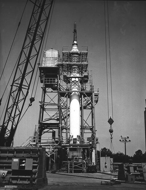 A Mercury-Redstone launch vehicle awaits test-firing in the Redstone Test Stand during the late 1950s. Between 1953 and 1960, the rocket team at Redstone Arsenal in Huntsville, Alabama performed hundreds of test firings on the Redstone rocket, over 200 on the Mercury-Redstone vehicle configuration alone. It was this configuration which launched America's first two marned space missions, Freedom 7 and Liberty Bell 7,in 1961.