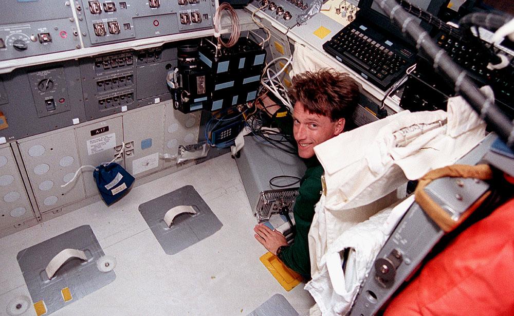 Space Shuttle Discovery (STS-56) onboard photo of Mission Specialist Michael Foale working in the Atmospheric Laboratory for Applications and Science (ATLAS-2). The ATLAS program was designed to measure the long term variability in the total energy radiated by the sun and determine the variability in the solar spectrum.