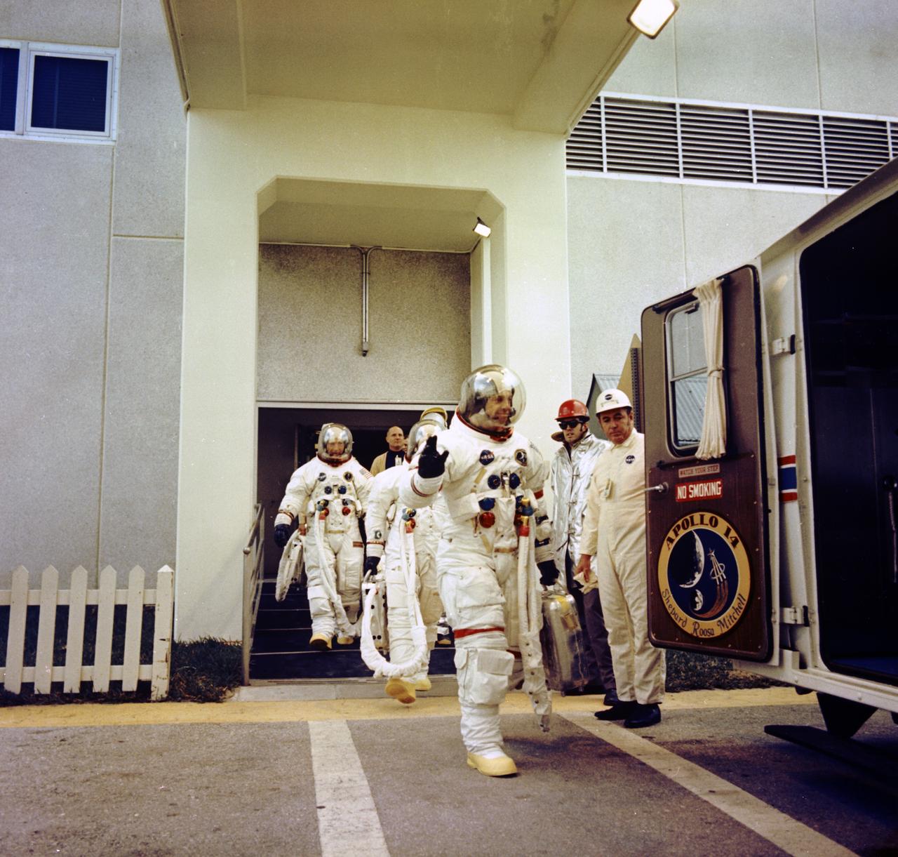 Apollo 14 Mission Commander, Alan B. Shepard, Jr., waves to well-wishers as he and astronauts Stuart A. Roosa, Command Module pilot; and Edgar D. Mitchell, Lunar Module pilot, walk to the transfer van during the countdown demonstration test. The Apollo 14, carrying the crew of three lifted off from launch complex 39A at KSC on January 31, 1971. It was the third manned lunar landing, the first manned landing in exploration of the lunar highlands, and it demonstrated pinpoint landing capability. The major goal of Apollo 14 was the scientific exploration of the Moon in the foothills of the rugged Fra Mauro region. The lunar surface extravehicular activity (EVA) of astronauts Shepard and Mitchell included setting up an automated scientific laboratory called Apollo Lunar Scientific Experiments Package (ALSEP), and collecting a total of about 95 pounds (43 kilograms) of Moon rock and soil for a geological investigation back on the Earth. Apollo 14 safely returned to Earth on February 9, 1971.