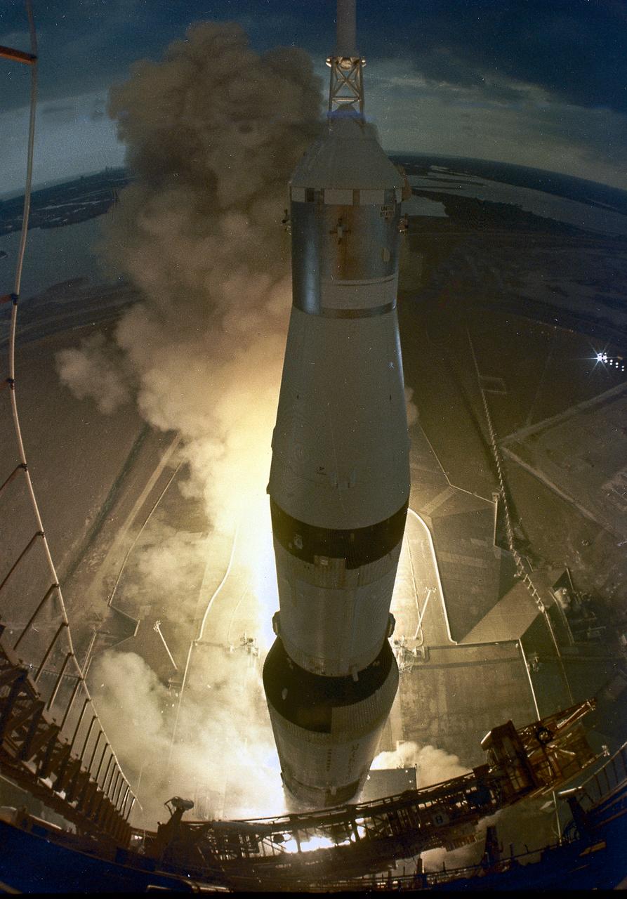 This is a view from sequential photographs of the Apollo 14 liftoff taken by a remote camera atop the 360-foot gantry level of Launch Complex 39A. The Apollo 14, carrying a crew of three astronauts: Mission commander Alan B. Shepard Jr., Command Module pilot Stuart A. Roosa, and Lunar Module pilot Edgar D. Mitchell, lifted off from launch complex 39A at the Kennedy Space Center on January 31, 1971. It was the third manned lunar landing, the first manned landing in exploration of the lunar highlands, and it demonstrated pinpoint landing capability. The major goal of Apollo 14 was the scientific exploration of the Moon in the foothills of the rugged Fra Mauro region. Activities of astronauts Shepard and Mitchell, during extravehicular activity (EVA) on the lunar surface, included setting up an automated scientific laboratory called Apollo Lunar Scientific Experiments Package (ALSEP), and collecting a total of about 95 pounds (43 kilograms) of Moon rock and soil for a geological investigation back on the Earth. 