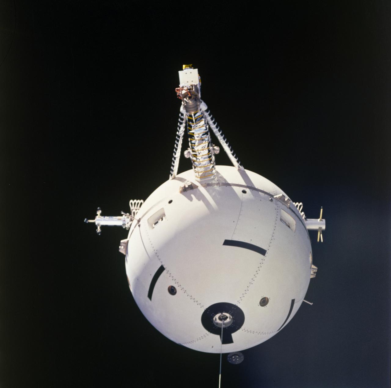 This Space Shuttle Orbiter Atlantis (STS-46) onboard photo is a close-up view of the Tethered Satellite System (TSS-1) in orbit above the Shuttle. A cooperative development effort by the Italian Space Agency (ASI) and NASA, the Tethered Satellite System (TSS) made capable the deployment and retrieval of a satellite which is attached by a wire tether from distances up to 100 km from the Orbiter. These free-flying satellites are used as observation platforms outside of the Orbiter.