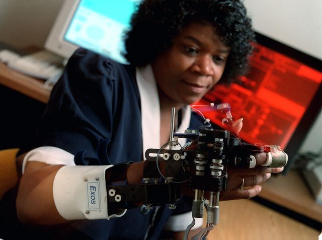 Virtual Reality (VR) can provide cost effective methods to design and evaluate components and systems for maintenance and refurbishment operations. The Marshall Space Flight Center (MSFC) in Huntsville, Alabama began to utilize VR for design analysis in the X-34 experimental reusable space vehicle. Analysts at MSFC's Computer Applications and Virtual Environments (CAVE) used Head Mounted Displays (HMD) (pictured), spatial trackers and gesture inputs as a means to animate or inhabit a properly sized virtual human model. These models were used in a VR scenario as a way to determine functionality of space and maintenance requirements for the virtual X-34. The primary functions of the virtual X-34 mockup was to support operations development and design analysis for engine removal, the engine compartment and the aft fuselage. This capability providedgeneral visualization support to engineers and designers at MSFC and to the System Design Freeze Review at Orbital Sciences Corporation (OSC). The X-34 program was cancelled in 2001.