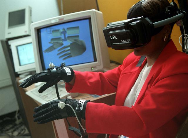 Virtual Reality (VR) can provide cost effective methods to design and evaluate components and systems for maintenance and refurbishment operations. The Marshall Space Flight Centerr (MSFC) in Huntsville, Alabama began to utilize VR for design analysis in the X-34 experimental reusable space vehicle. Analysts at MSFC's Computer Applications and Virtual Environments (CAVE) used Head Mounted Displays (HMD) (pictured), spatial trackers and gesture inputs as a means to animate or inhabit a properly sized virtual human model. These models were used in a VR scenario as a way to determine functionality of space and maintenance requirements for the virtual X-34. The primary functions of the virtual X-34 mockup was to support operations development and design analysis for engine removal, the engine compartment and the aft fuselage. This capability provided general visualization support to engineers and designers at MSFC and to the System Design Freeze Review at Orbital Sciences Corporation (OSC). The X-34 program was cancelled in 2001.