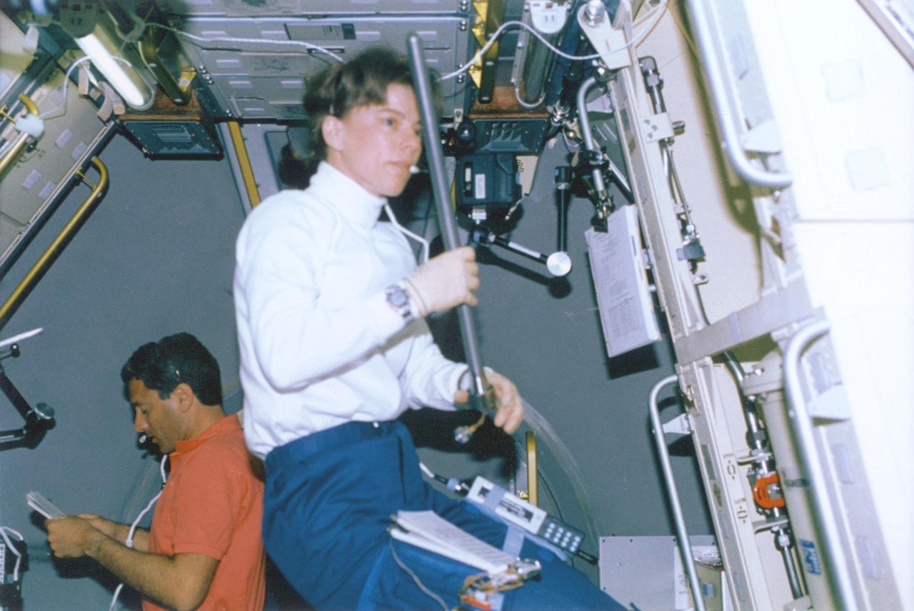 Payload Commander, Bornie Dunbar loading samples in the CGF onboard STS-50, USML-1.