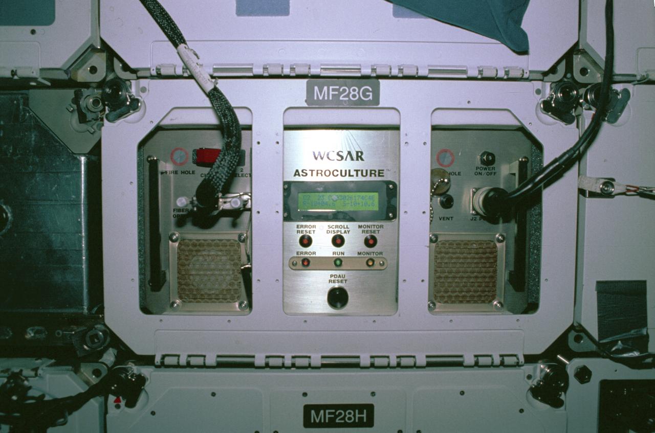 The first United States Microgravity Laboratory (USML-1) was one of NASA's science and technology programs that provided scientists an opportunity to research various scientific investigations in a weightless environment inside the Spacelab module. It also provided demonstrations of new equipment to help prepare for advanced microgravity research and processing aboard the Space Station. The USML-1 flew in orbit for extended periods, providing greater opportunities for research in materials science, fluid dynamics, biotechnology (crystal growth), and combustion science. This is a close-up view of the Astroculture experiment rack in the middeck of the orbiter. The Astroculture experiment was to evaluate and find effective ways to supply nutrient solutions for optimizing plant growth and avoid releasing solutions into the crew quarters in microgravity. Since fluids behave differently in microgravity, plant watering systems that operate well on Earth do not function effectively in space. Plants can reduce the costs of providing food, oxygen, and pure water, as well as lower the costs of removing carbon dioxide in human space habitats. The USML-1 flew aboard the STS-50 mission on June 1992 and was managed by the Marshall Space Flight Center.