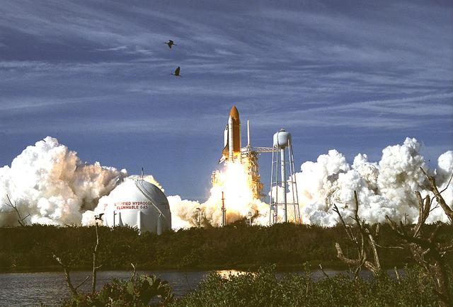 Clear skies, tranquil winds, and a brilliant morning sun mark the ontime liftoff of Space Shuttle Columbia (STS-62) from Launch Pad 39B. Columbia began the 61st Space Shuttle flight, which was a 14-day extended duration flight. On board, five veteran crew members performed materials processing experiments on the United States Microgravity Payload 2 (USMP-2), and also conducted experiments designed to enable or extend space flight technology aboard the Office of Aeornautics and Space Technology 2 payload (OAST-2).