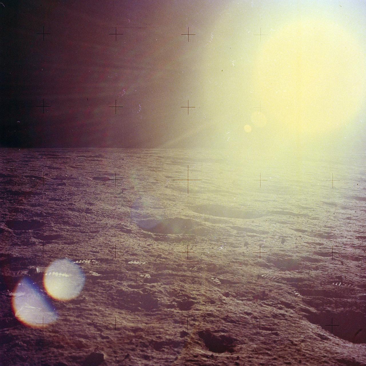 The second manned lunar landing mission, Apollo 12, launched from launch pad 39-A at Kennedy Space Center in Florida on November 14, 1969 via a Saturn V launch vehicle. The Saturn V vehicle was developed by the Marshall Space Flight Center (MSFC) under the direction of Dr. Wernher von Braun. Aboard Apollo 12 was a crew of three astronauts: Alan L. Bean, pilot of the Lunar Module (LM), Intrepid; Richard Gordon, pilot of the Command Module (CM), Yankee Clipper; and Spacecraft Commander Charles Conrad. The LM, Intrepid, landed astronauts Conrad and Bean on the lunar surface in what’s known as the Ocean of Storms while astronaut Richard Gordon piloted the CM, Yankee Clipper, in a parking orbit around the Moon. Lunar soil activities included the deployment of the Apollo Lunar Surface Experiments Package (ALSEP), finding the unmanned Surveyor 3 that landed on the Moon on April 19, 1967, and collecting 75 pounds (34 kilograms) of rock samples. This is the seventeenth of 25 images captured by the crew in attempt to provide a 360 degree Lunar surface scene. Apollo 12 safely returned to Earth on November 24, 1969.