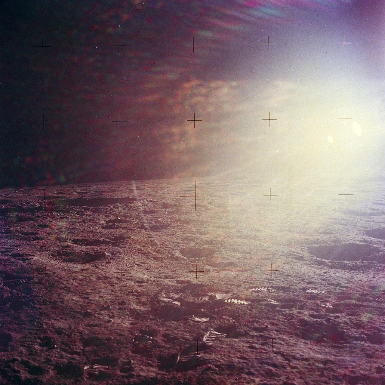 The second manned lunar landing mission, Apollo 12, launched from launch pad 39-A at Kennedy Space Center in Florida on November 14, 1969 via a Saturn V launch vehicle. The Saturn V vehicle was developed by the Marshall Space Flight Center (MSFC) under the direction of Dr. Wernher von Braun. Aboard Apollo 12 was a crew of three astronauts: Alan L. Bean, pilot of the Lunar Module (LM), Intrepid; Richard Gordon, pilot of the Command Module (CM), Yankee Clipper; and Spacecraft Commander Charles Conrad. The LM, Intrepid, landed astronauts Conrad and Bean on the lunar surface in what’s known as the Ocean of Storms while astronaut Richard Gordon piloted the CM, Yankee Clipper, in a parking orbit around the Moon. Lunar soil activities included the deployment of the Apollo Lunar Surface Experiments Package (ALSEP), finding the unmanned Surveyor 3 that landed on the Moon on April 19, 1967, and collecting 75 pounds (34 kilograms) of rock samples. This is the eighteenth of 25 images captured by the crew in attempt to provide a 360 degree Lunar surface scene. Apollo 12 safely returned to Earth on November 24, 1969.