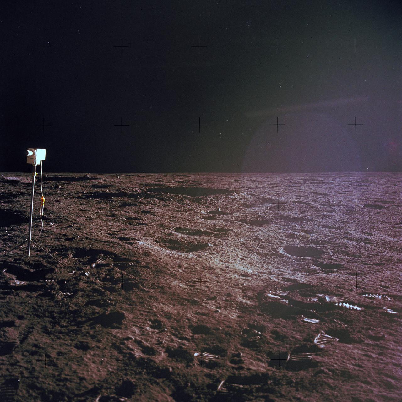 The second manned lunar landing mission, Apollo 12, launched from launch pad 39-A at Kennedy Space Center in Florida on November 14, 1969 via a Saturn V launch vehicle. The Saturn V vehicle was developed by the Marshall Space Flight Center (MSFC) under the direction of Dr. Wernher von Braun. Aboard Apollo 12 was a crew of three astronauts: Alan L. Bean, pilot of the Lunar Module (LM), Intrepid; Richard Gordon, pilot of the Command Module (CM), Yankee Clipper; and Spacecraft Commander Charles Conrad. The LM, Intrepid, landed astronauts Conrad and Bean on the lunar surface in what’s known as the Ocean of Storms while astronaut Richard Gordon piloted the CM, Yankee Clipper, in a parking orbit around the Moon. Lunar soil activities included the deployment of the Apollo Lunar Surface Experiments Package (ALSEP), finding the unmanned Surveyor 3 that landed on the Moon on April 19, 1967, and collecting 75 pounds (34 kilograms) of rock samples. This is the nineteenth of 25 images captured by the crew in attempt to provide a 360 degree Lunar surface scene. Apollo 12 safely returned to Earth on November 24, 1969.