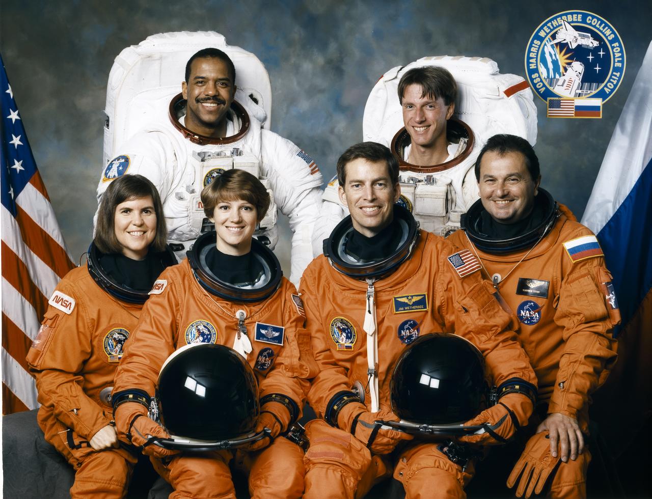 Crew members assigned to the STS-63 mission included (front left to right) Janice E. Voss, mission specialist; Eileen M. Collins, pilot; (the first woman to pilot a Space Shuttle), James D. Wetherbee, commander; and Vladmir G. Titov (Cosmonaut). Standing in the rear are mission specialists Bernard A. Harris, and C. Michael Foale.  Launched aboard the Space Shuttle Discovery on February 3, 1995 at 12:22:04 am (EST), the primary payload for the mission was the SPACEHAB-3.  STS-63 marked the first approach and fly around by the Shuttle with the Russian space station Mir.