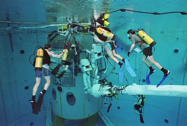 Underwater training is conducted in Marshall's Neutral Buoyancy Simulator (NBS) in preparation for on-orbit Hubble Space Telescope operations.