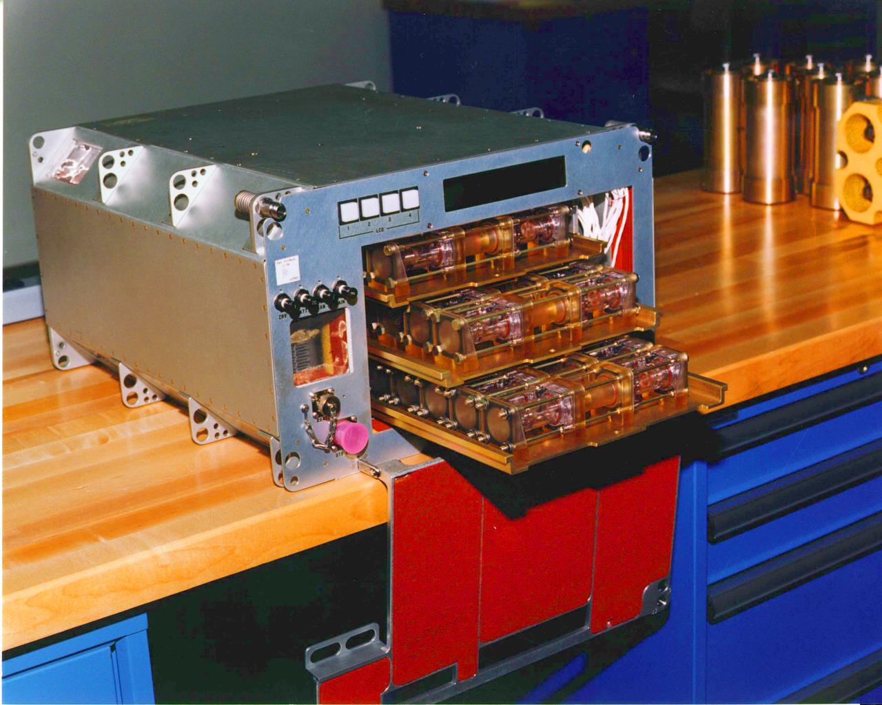 (DCAM) Diffusion Controlled Crystallization Apparatus for Microgravity Trays mounted in (STES) Single Locker Thermal Enclosure System.