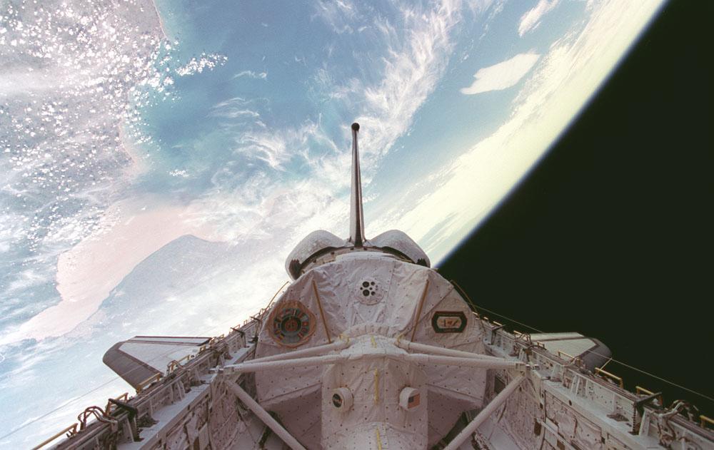 Onboard photo of space shuttle Columbia (STS-73) cargo bay payload - the United States Microgravity Laboratory-2 (USML-2) with an earthview.