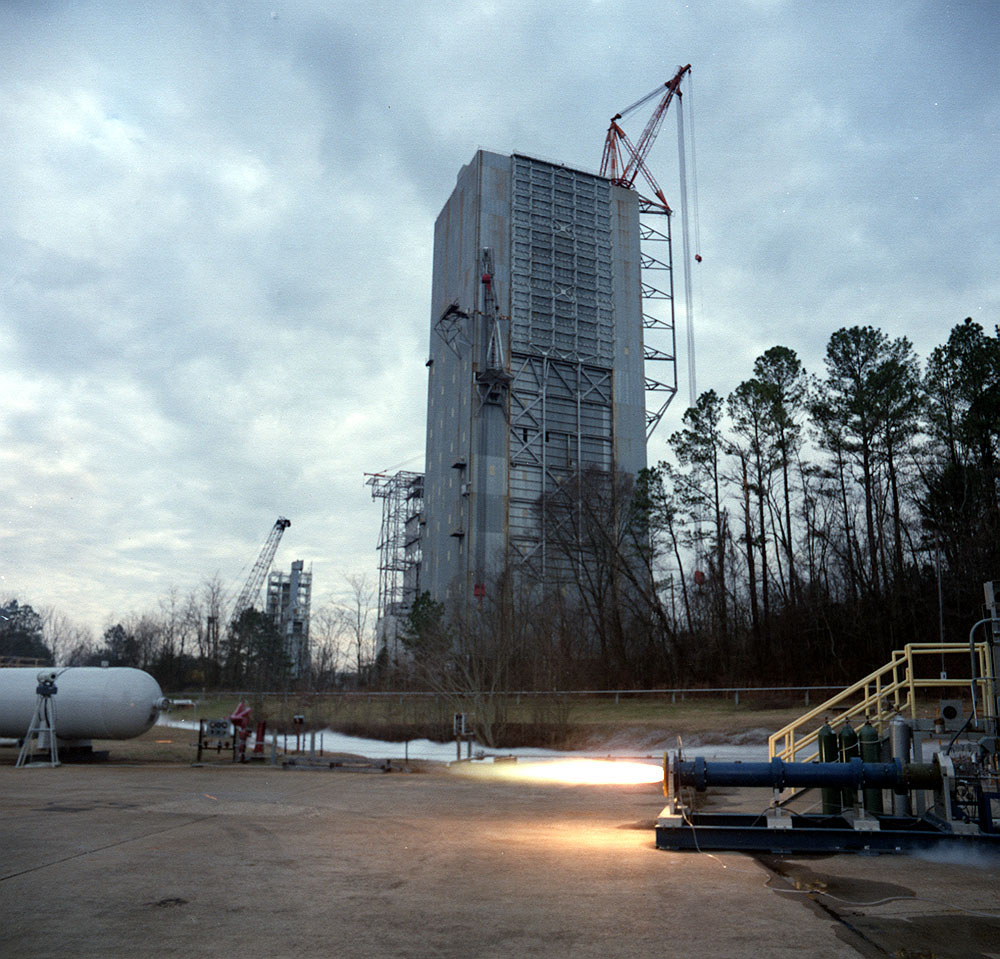 An 11 inch (11) hybrid motor fuel grain variation test firing at Marshall's Test Stand 500.