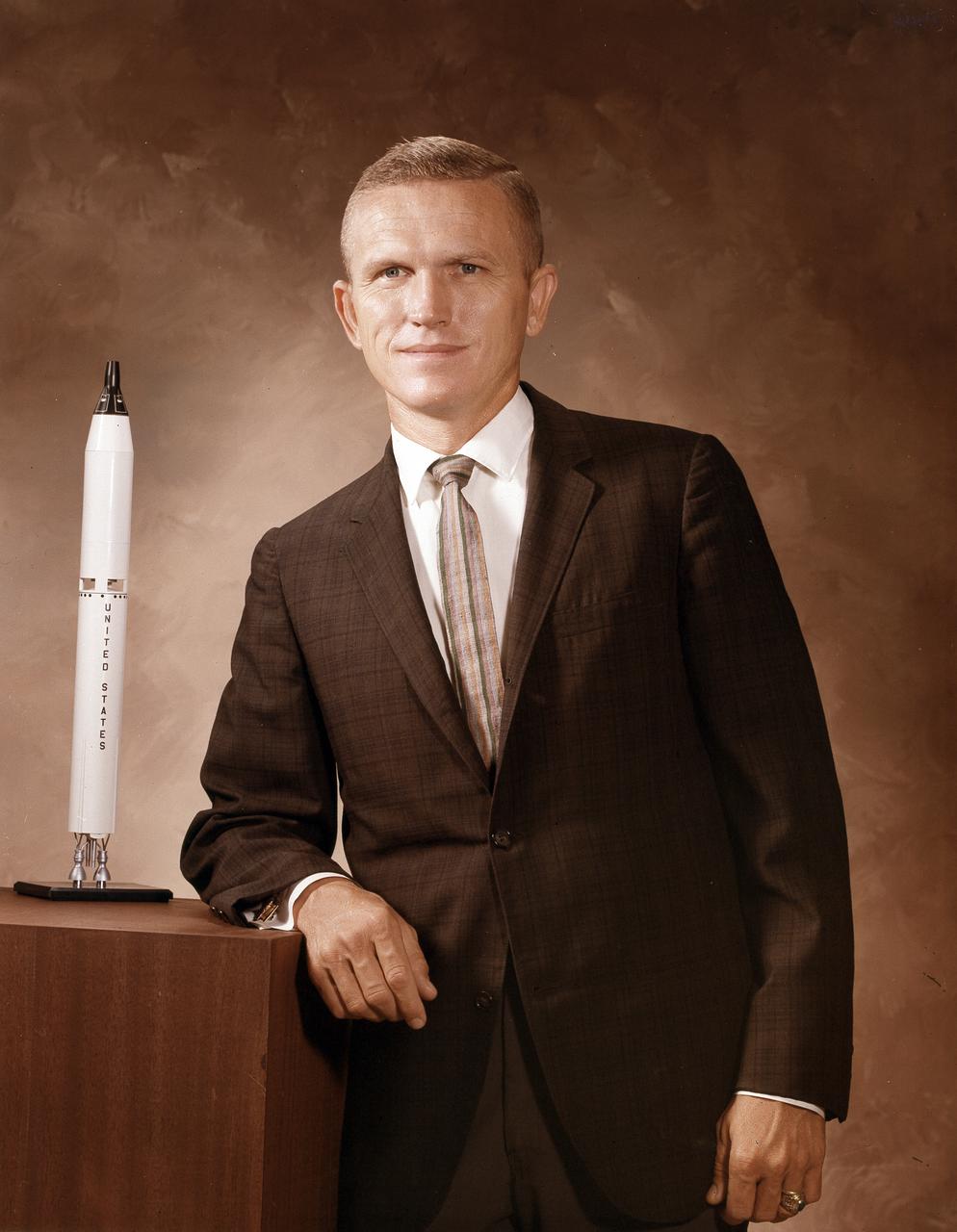 This is the official portrait of astronaut Frank Borman. A career Air Force officer from 1950, his assignments included service as a fighter pilot, an operational pilot and instructor, an experimental test pilot and an assistant professor of thermodynamics and fluid mechanics at West Point. When selected by NASA, Frank Borman was an instructor at the Aerospace Research Pilot School at Edwards AFB, California. In 1967 he served as a member of the Apollo 204 Fire Investigation Board, investigating the causes of the fire which killed three astronauts aboard an Apollo spacecraft. Later he became the Apollo Program Resident Manager, heading the team that reengineered the Apollo spacecraft. He also served as Field Director of the NASA Space Station Task Force. Frank Borman retired from the air Force in 1970, but is well remembered as a part of American history as a pioneer in the exploration of space. He is a veteran of both the Gemini 7, 1965 Space Orbital Rendezvous with Gemini 6 and the first manned lunar orbital mission, Apollo 8, in 1968.