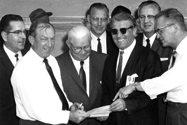 This is a photograph of a group of government officials touring the Marshall Space Flight Center in July 1961 with Dr. von Braun. Second from left is Alabama Congressman Robert Jones.