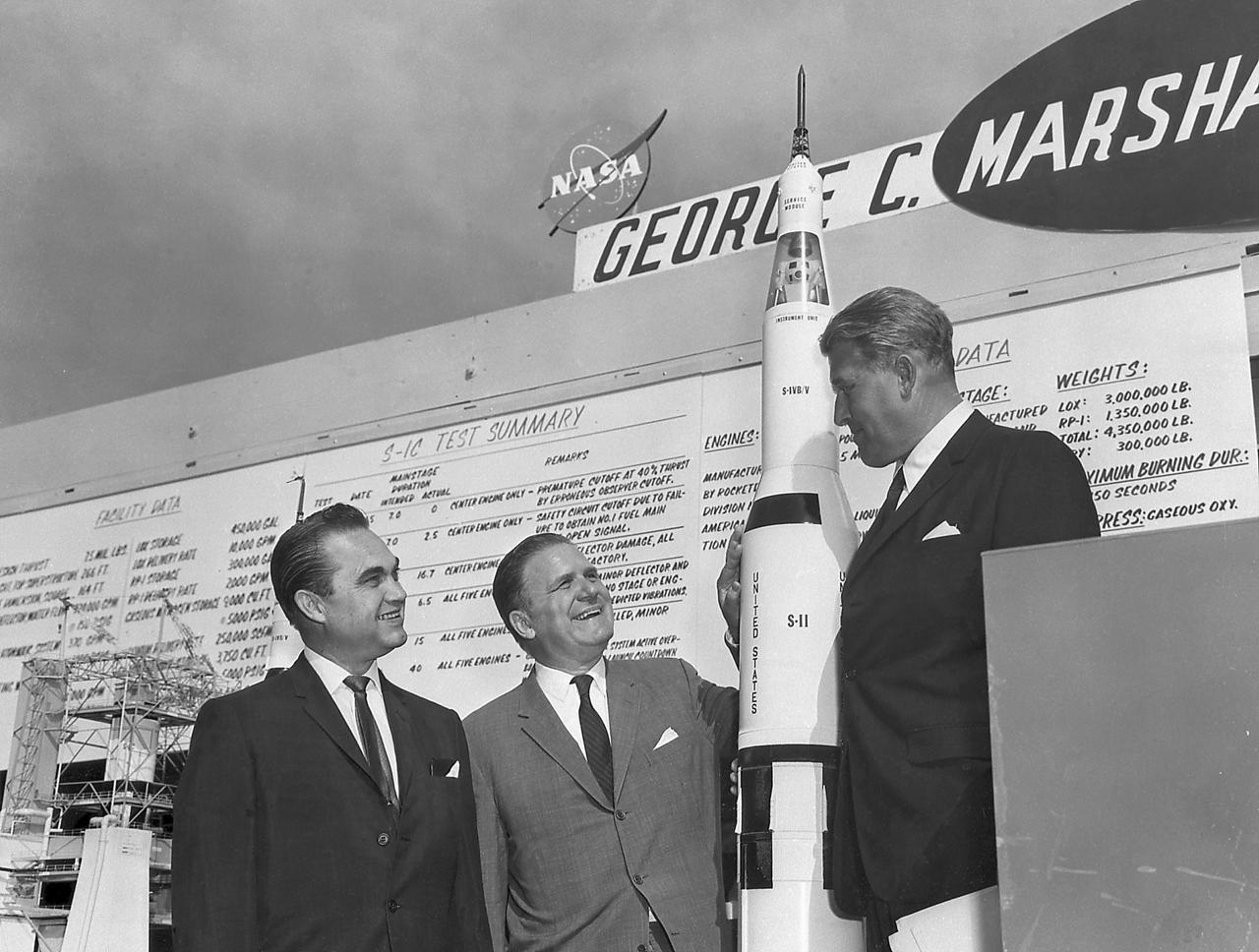 Governor of Alabama George Wallace (left), NASA Administrator James Webb and Marshall Space Flight Center (MSFC) Director Dr. von Braun during a tour of MSFC on June 8, 1965. Governor Wallace and Dr. Webb were at MSFC to witness the first test firing of a Saturn V Booster, along with members of the Alabama legislature and press reporters. 
