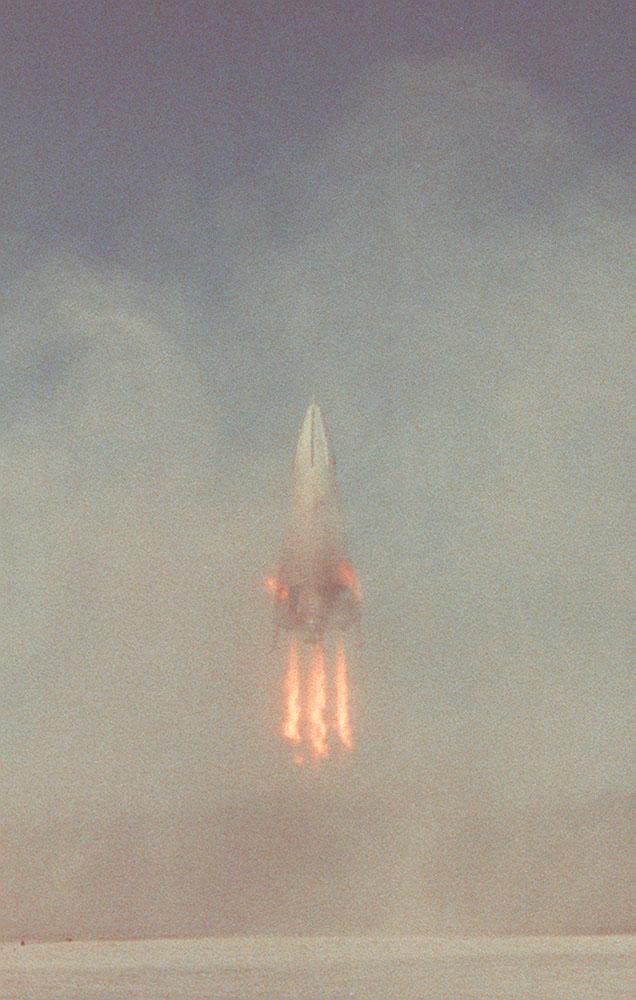 The Delta Clipper-Experimental Advanced (DC-XA) is a single-stage-to-orbit, vertical takeoff / vertical landing launch vehicle concept, whose development was geared to significantly reduce launch cost and provided a test bed for NASA Reusable Launch Vehicle (RLV) technology. This photograph shows the descending vehicle landing during the first successful test flight at White Sands Missile Range, New Mexico. The program was discontinued in 2003.