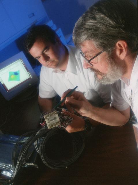 Researchers at Marshall's Space Science Laboratory successfully demonstrate that linear arrays of Hall probes can be constructed in high Hall coefficient films and used to digitally image magnetic fields. This research is beneficial to visually imaging any magnetic field.