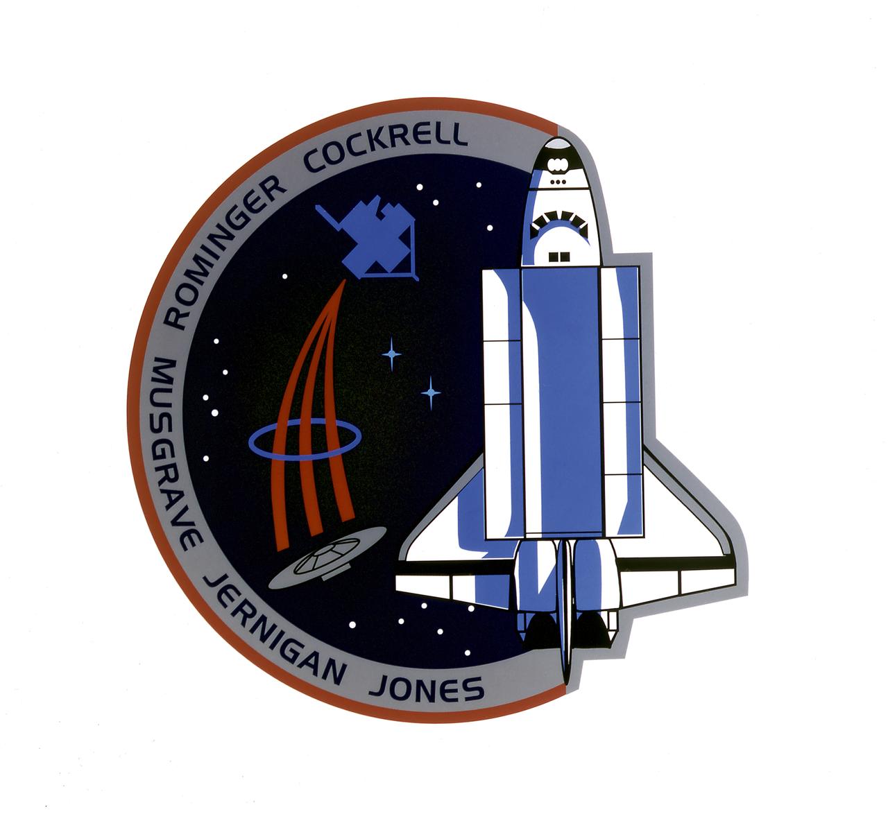 This mission patch for mission STS-80 depicts the Space Shuttle Columbia and the two research satellites its crew deployed into the blue field of space. The uppermost satellite is the Orbiting Retrievable Far and Extreme Ultraviolet Spectrograph-Shuttle Pallet Satellite (ORFEUS-SPAS), a telescope aimed at unraveling the life cycles of stars and understanding the gases that drift between them. The lower satellite is the Wake Shield Facility (WSF), flying for the third time. It will use the vacuum of space to create advanced semiconductors for the nation's electronics industry. ORFEUS and WSF are joined by the symbol of the Astronaut Corps, representing the human contribution to scientific progress in space. The two bright blue stars represent the mission's Extravehicular Activities (EVA), final rehearsals for techniques and tools to be used in assembly of the International Space Station (ISS). Surrounding Columbia is a constellation of 16 stars, one for each day of the mission, representing the stellar talents of the ground and flight teams that share the goal of expanding knowledge through a permanent human presence in space. 