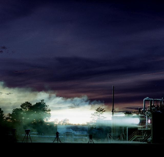 750 K motor test firing at Marshall's Test Stand 116 developing 650 pounds of thrust. The motor was tested for the Air Force Expendable Launch Vehicle (ELV) project.