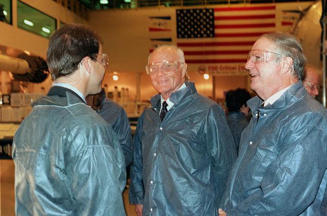 One of NASA's first astronauts, now Senator John Glenn and Alabama senatorial candidate Roger Bedford receive a tour of the Space Station manufacturing facility conducted by Marshall Space Flight Center (MSFC) Director Jerroll W. Littles.
