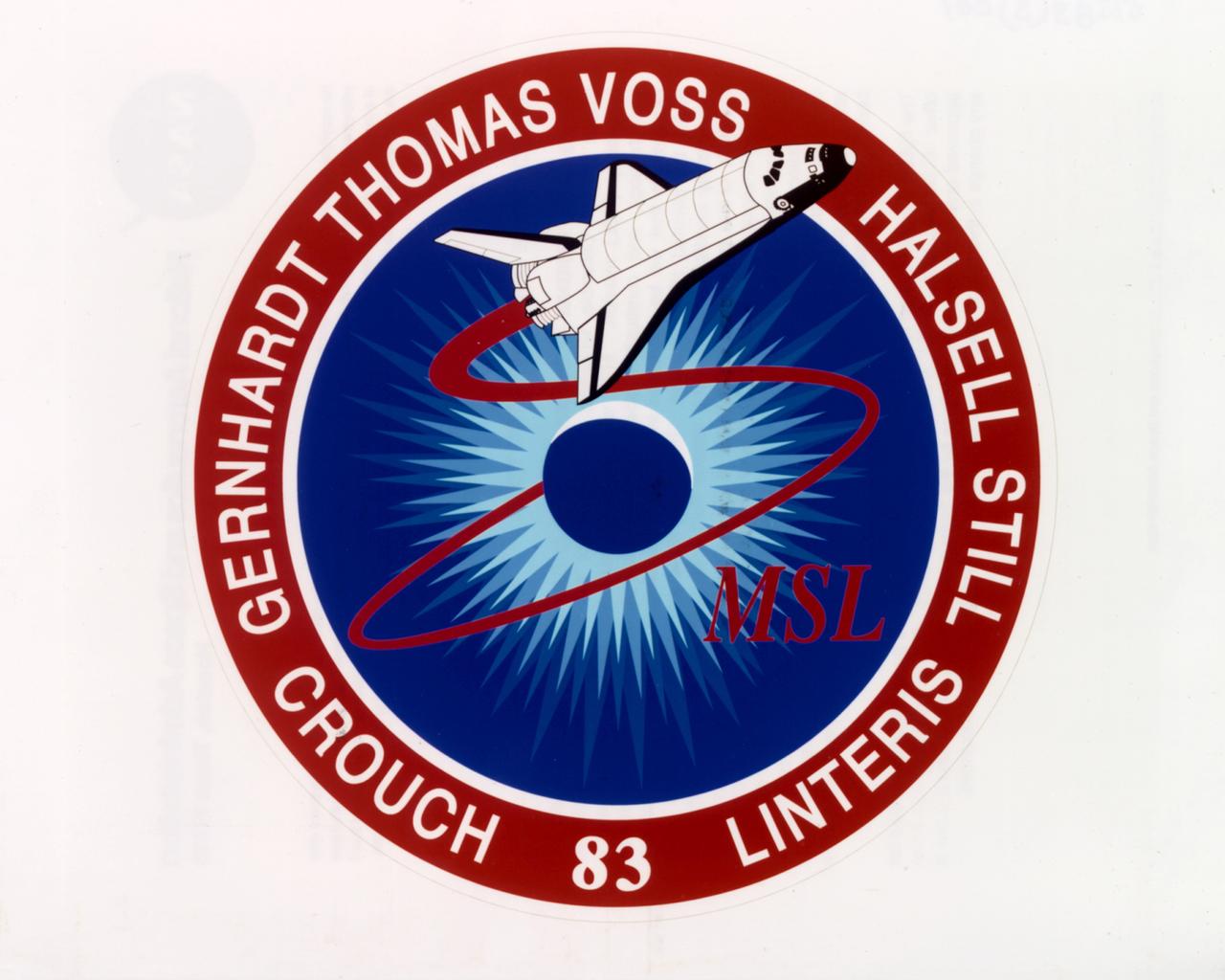 The crew patch for NASA's STS-83 mission depicts the Space Shuttle Columbia launching into space for the first Microgravity Sciences Laboratory 1 (MSL-1) mission. MSL-1 investigated materials science, fluid dynamics, biotechnology, and combustion science in the microgravity environment of space, experiments that were conducted in the Spacelab Module in the Space Shuttle Columbia's cargo bay. The center circle symbolizes a free liquid under microgravity conditions representing various fluid and materials science experiments. Symbolic of the combustion experiments is the surrounding starburst of a blue flame burning in space. The 3-lobed shape of the outermost starburst ring traces the dot pattern of a transmission Laue photograph typical of biotechnology experiments. The numerical designation for the mission is shown at bottom center. As a forerunner to missions involving International Space Station (ISS), STS-83 represented the hope that scientific results and knowledge gained during the flight will be applied to solving problems on Earth for the benefit and advancement of humankind. 