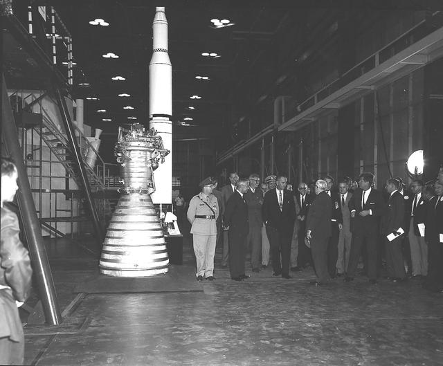 Marshall Space Flight Center Director Dr. Wernher von Braun explains a detail from a Saturn IB mockup and engine to President John F. Kennedy, Vice President Lyndon Johnson and other guests, September 11, 1962.