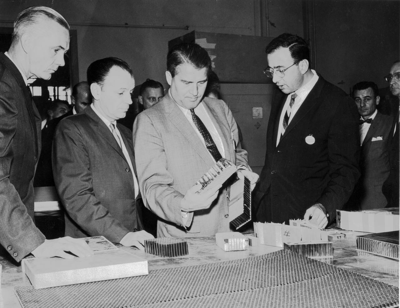 This is a photograph of Dr. von Braun, taken in 1961, visiting North American Aviation's Space and Information Systems Division in Downey, California.