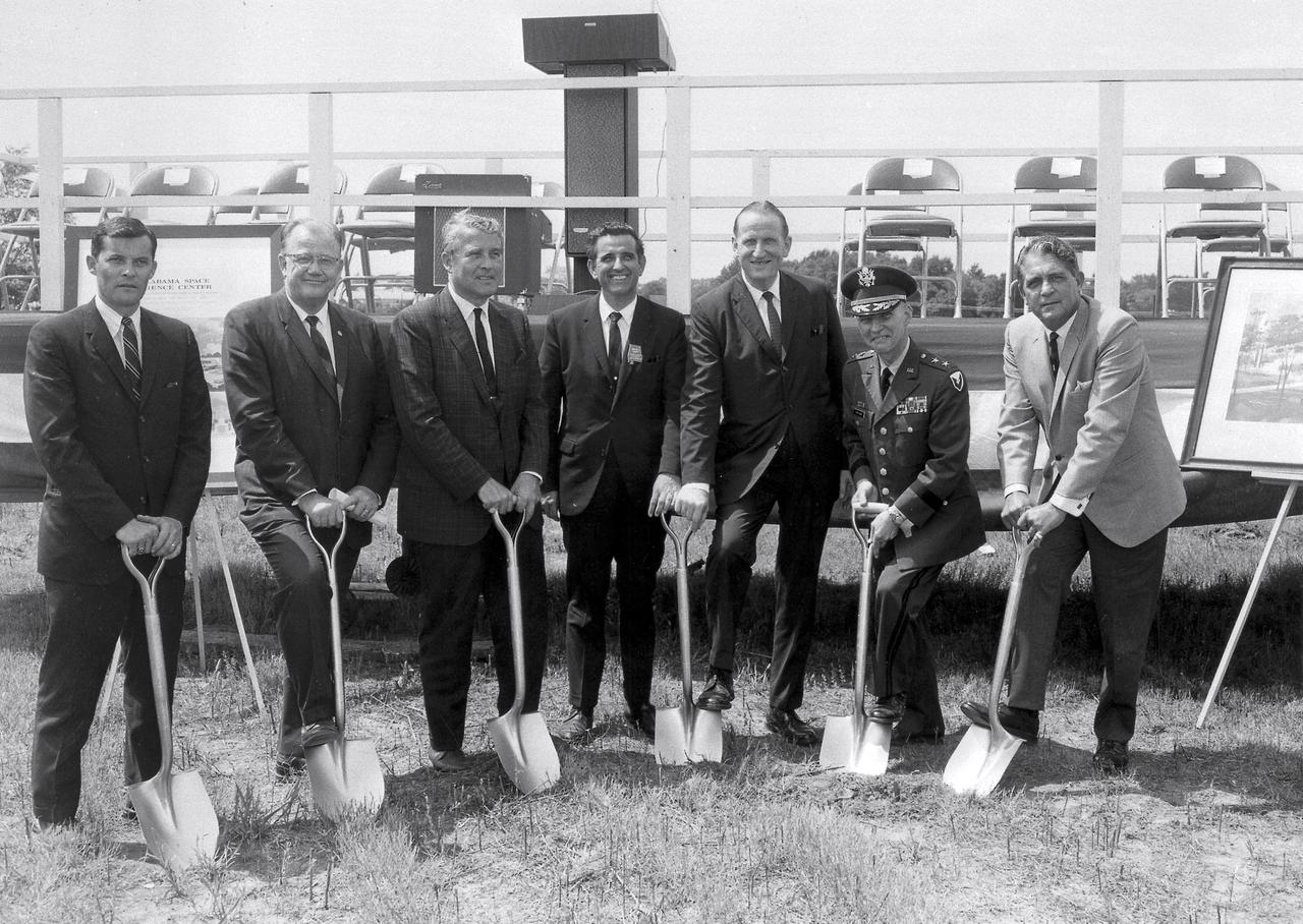 Ground breaking ceremony for the Alabama Space Science Center, later renamed the U.S. Space and Rocket Center. Shown in this picture, left to right, are Edward O. Buckbee, Space Center Director; Jack Giles, Alabama State Senator of Huntsville; Dr. Wernher on Braun, Marshall Space Flight Center (MSFC) Director; Martin Darity, head of the Alabama Publicity Bureau (representing Governor Albert Brewer); James Allen, former Lieutenant governor, chairman of the Alabama Space Science Exhibit Commission; Major General Charles Eifler, commanding general of the Army Ordnance Missile Command; and Huntsville Mayor Glenrn Hearn. (Courtesy of Huntsville/Madison County Public Library)