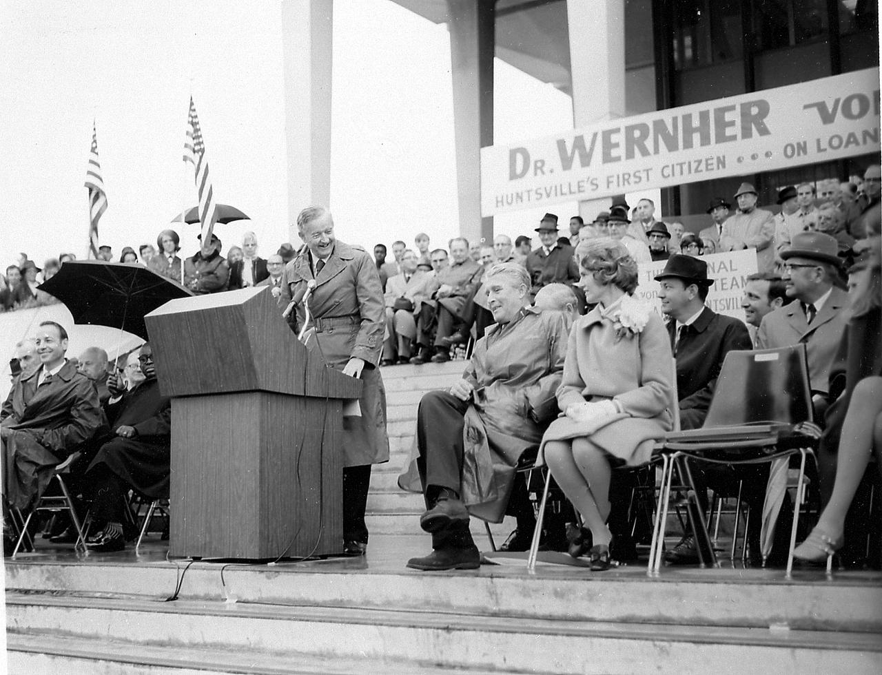 Prior to MSFC (Marshall Space Flight Center) Director, Dr. von Braun's transfer to NASA Headquarters where he had been appointed Deputy Associate Administrator for Plarning, he was honored during a series of events recognizing his contribution to the space effort during his career in Huntsville, Alabama. In this photo at the Madison County Courthouse, Dr. von Braun is shown seated next to his wife, Maria, as U.S. Senator John Sparkman comments on his career in Huntsville, Alabama, where he worked for both the Army and NASA (National Aeronautic Space Administration). 
