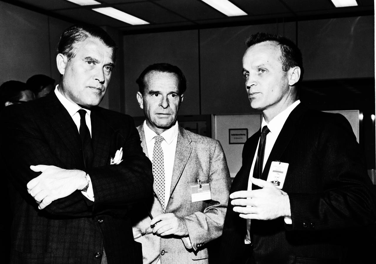 This photograph is dated October 14, 1964, and shows Dr. von Braun, left, during a tour of the NASA Marned Spacecraft Center, now the Johnson Space Center. He is with Dr. J.P. Kuettner, center, from the Marshall Space Flight Center, and Warren J. North from the Manned Spacecraft Center.